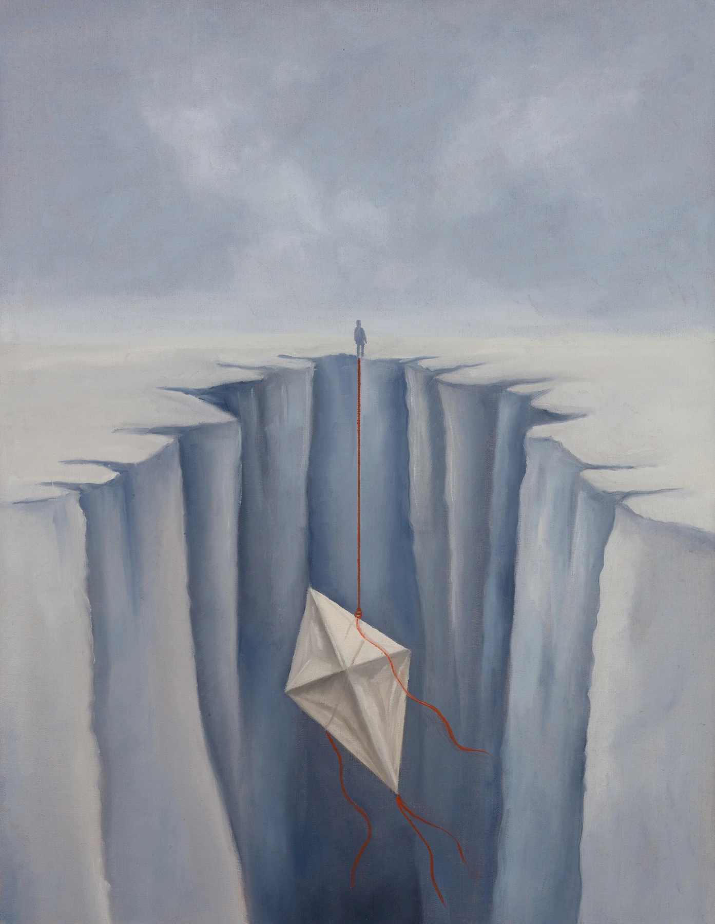 A kite hanging over a deep chasm